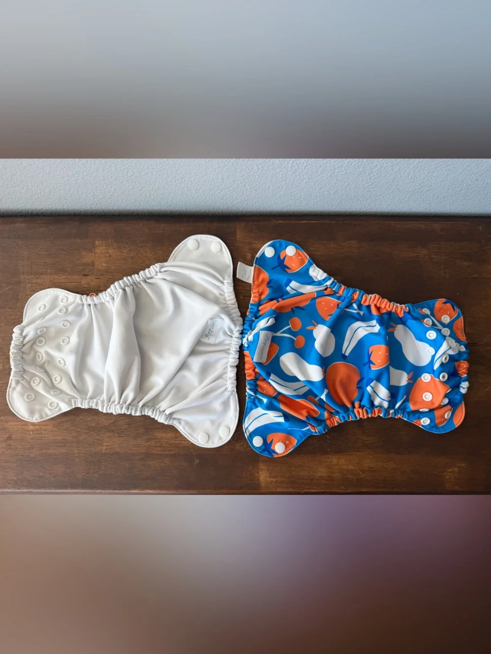 Esembly lot of 2 snap cloth diaper covers size 1 7-17lbs